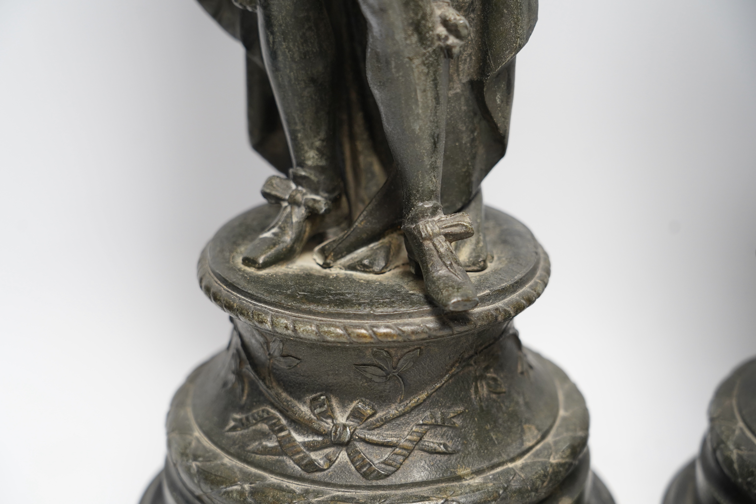 A pair of early 20th century spelter figures of cavaliers, 49cm